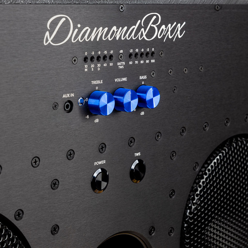 zoomed in view of diamondboxx logo, power, and tws buttons on the front of black L3 speaker with blue knobs