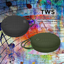 pair of 10tws speakers with colorful background